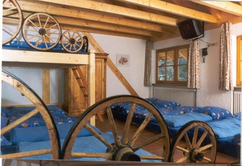 a room with two bunk beds andokedokedokedoked at Erlebnisgastronomie Lochmuhle in Eigeltingen