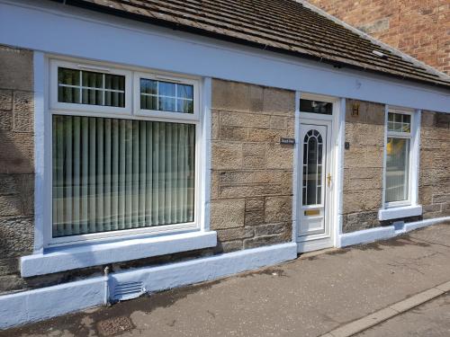 a building with a window and a door at Churchview in Townhill