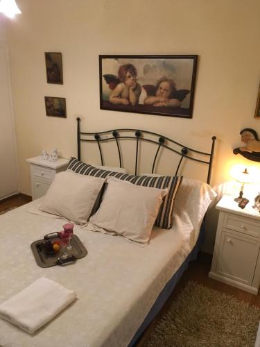 Ένα ή περισσότερα κρεβάτια σε δωμάτιο στο Art island house