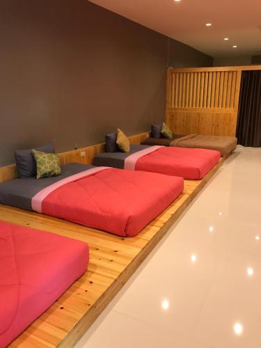 Postel nebo postele na pokoji v ubytování The Sun resort Ratchaburi