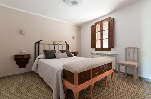 Casa Dominica tesisinde bir odada yatak veya yataklar