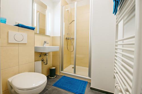 Ein Badezimmer in der Unterkunft Kronser Ferienwohnungen