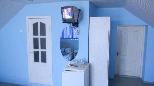 Телевизор и/или развлекательный центр в Chastniy Dom Sim-Sim