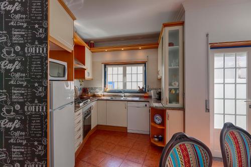 Kuchyň nebo kuchyňský kout v ubytování Like-home Boa Onda House