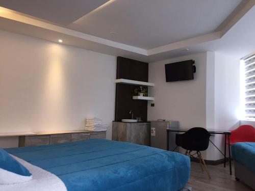 Postel nebo postele na pokoji v ubytování El Camino Hotel