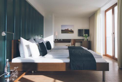 Postel nebo postele na pokoji v ubytování Das Wildeck Hotel & Restaurant