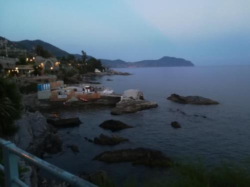 a view of a body of water at night at Casa Chicca Free Parking in Genova