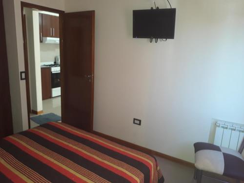 Llit o llits en una habitació de Dpto centrico