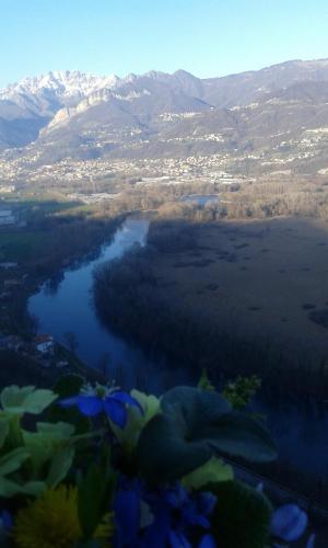 a view of a lake with mountains in the background at "LA TAVERNA" B&B in Airuno