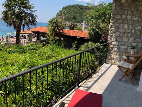a balcony of a house with a view of the ocean at Sea forever in Petrovac na Moru
