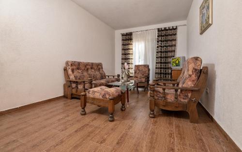 O zonă de relaxare la Tea Apartman