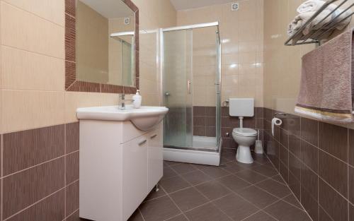 O baie la Tea Apartman