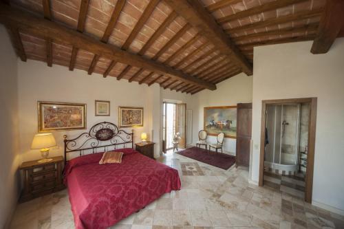 Ένα ή περισσότερα κρεβάτια σε δωμάτιο στο Agritourist Podere