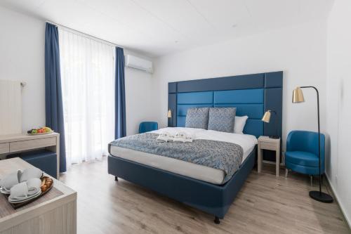 Ein Bett oder Betten in einem Zimmer der Unterkunft Residence Mutschellen