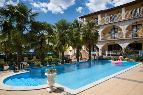 The swimming pool at or close to Apartments Paradis