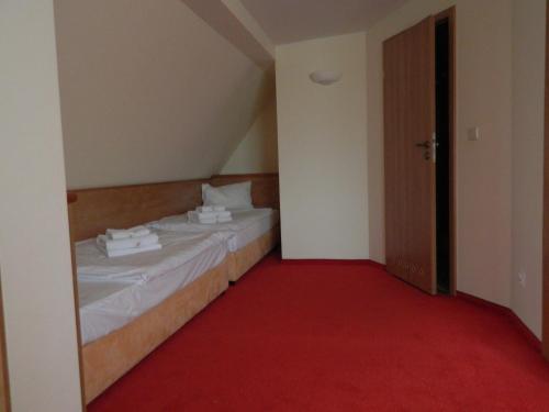 Postel nebo postele na pokoji v ubytování Trofana Wellness & SPA