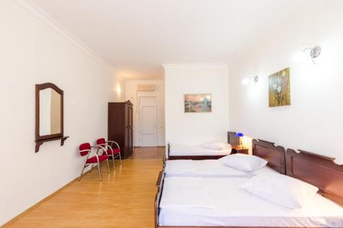 Postel nebo postele na pokoji v ubytování Hotel Simpatia