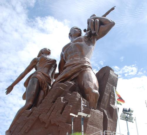 a statue of two men on a rock formation at Safari Village Saly V 225 in Saly Portudal