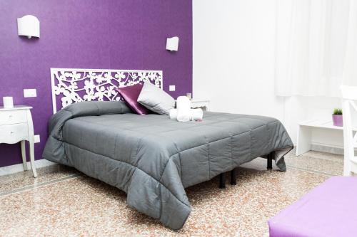 Postel nebo postele na pokoji v ubytování Re di Luna B&B