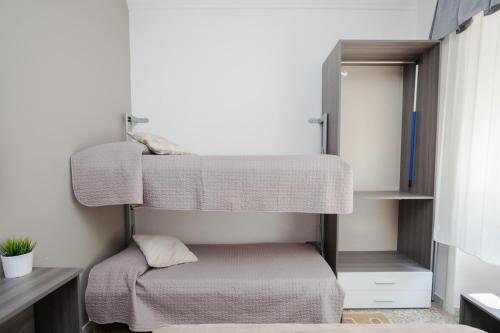 Postel nebo postele na pokoji v ubytování Re di Luna B&B