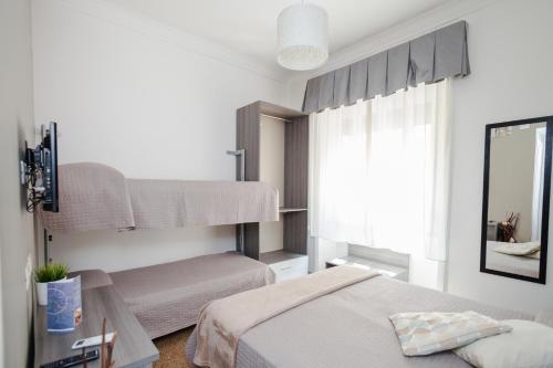 Postel nebo postele na pokoji v ubytování Re di Luna B&B