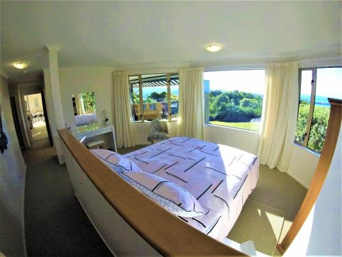 En eller flere senge i et værelse på Twin Peaks Villa
