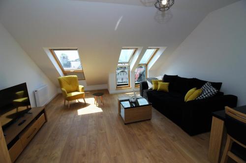 Гостиная зона в Apartamenty Przy Latarni Kropla Bałtyku