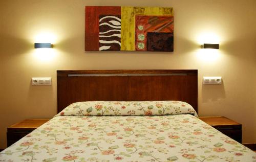 Ένα ή περισσότερα κρεβάτια σε δωμάτιο στο Apartamentos La Barzana