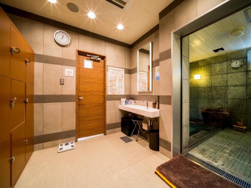 A bathroom at Super Hotel Niihama