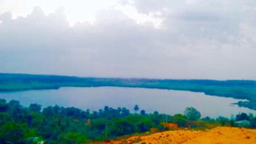 an aerial view of a lake on a hill at Sunntop Cabana in Trincomalee