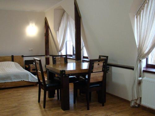 Postel nebo postele na pokoji v ubytování Hotel Zolota Pidkova