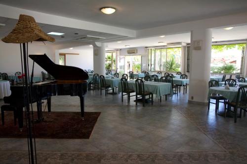 מסעדה או מקום אחר לאכול בו ב-Hotel Club Costa Smeralda