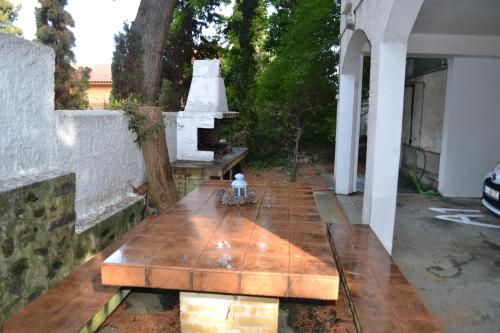 Patio nebo venkovní prostory v ubytování Evaliana Seaside Apartment