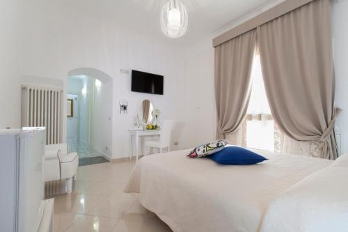 Posteľ alebo postele v izbe v ubytovaní San Nicola B&B