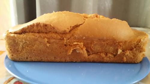 a piece of cake sitting on a blue plate at La Casa Del Grillo 1 in Aosta