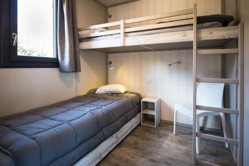 Postel nebo postele na pokoji v ubytování Camping Mas De Pierredon
