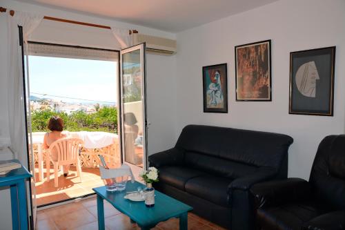 Χώρος καθιστικού στο Hotel Al-Andalus