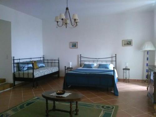 Postelja oz. postelje v sobi nastanitve Palazzo Laurice
