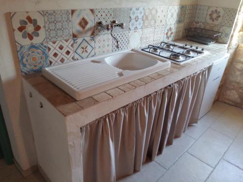 Virtuvė arba virtuvėlė apgyvendinimo įstaigoje Case Vacanza Al Borgo Antico