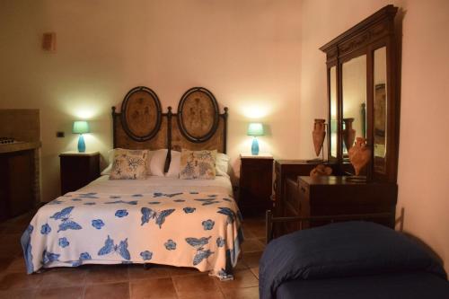 A bed or beds in a room at B&b Lemon Garden