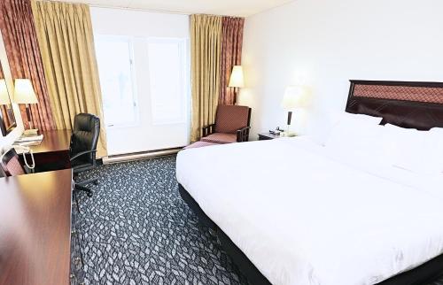 Postel nebo postele na pokoji v ubytování LELUX Hotel