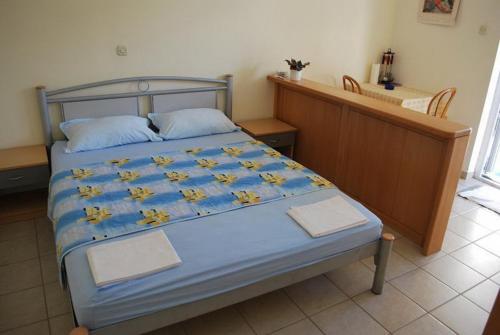 Postel nebo postele na pokoji v ubytování Apartment Supetarska Draga 3