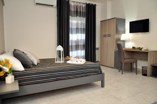 Posteľ alebo postele v izbe v ubytovaní Kalurya