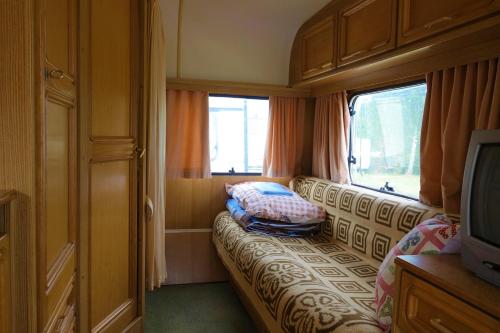 Postel nebo postele na pokoji v ubytování Camping Pod Żaglem