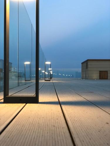 a view of a building with lights on the floor at Bellini Relais in Lignano Sabbiadoro