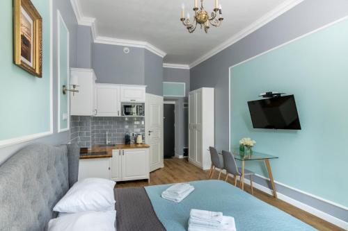 Kuchyň nebo kuchyňský kout v ubytování Domles Apartments