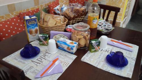 a table with food and snacks on top of it at B&B Casa Dei Mille in Pizzo