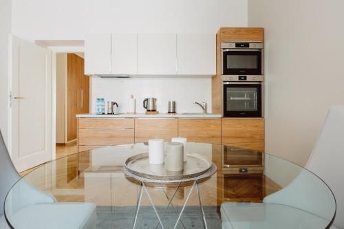 Virtuvė arba virtuvėlė apgyvendinimo įstaigoje 4Seasons﻿ Apartments Cracow