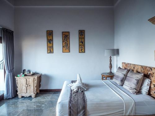 Ένα ή περισσότερα κρεβάτια σε δωμάτιο στο Amed Beach Villa