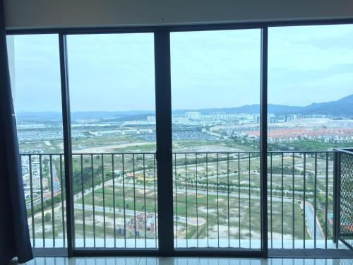a view of a city from a window at SHAHALAM ALLBESS@TREFOIL in Setia Alam